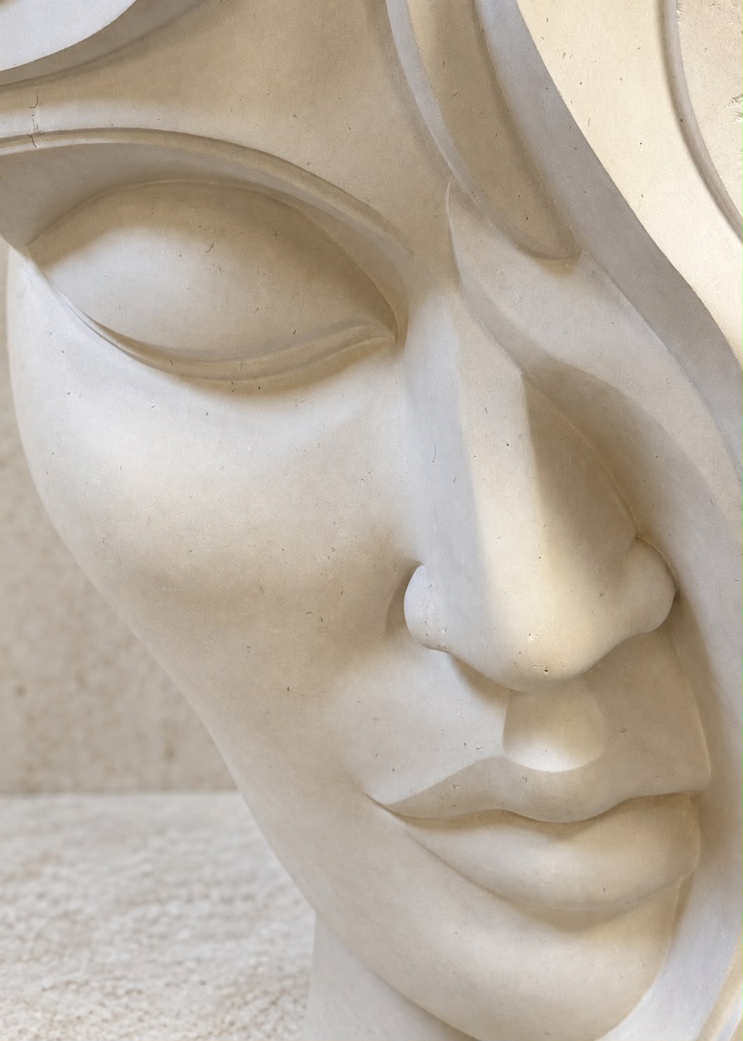 Homepage – bottom stone sculpture Hand-carved pale stone sculpture by Jo Sell